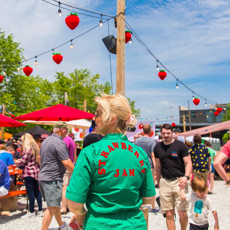 Jeni Britton wearing a green strawberry jam shirt