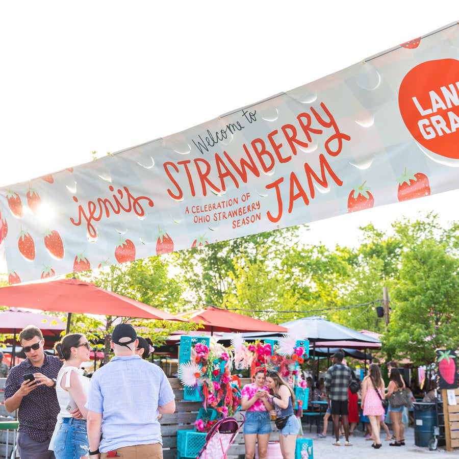 Jeni's strawberry jam banner hanging up outside a brewery