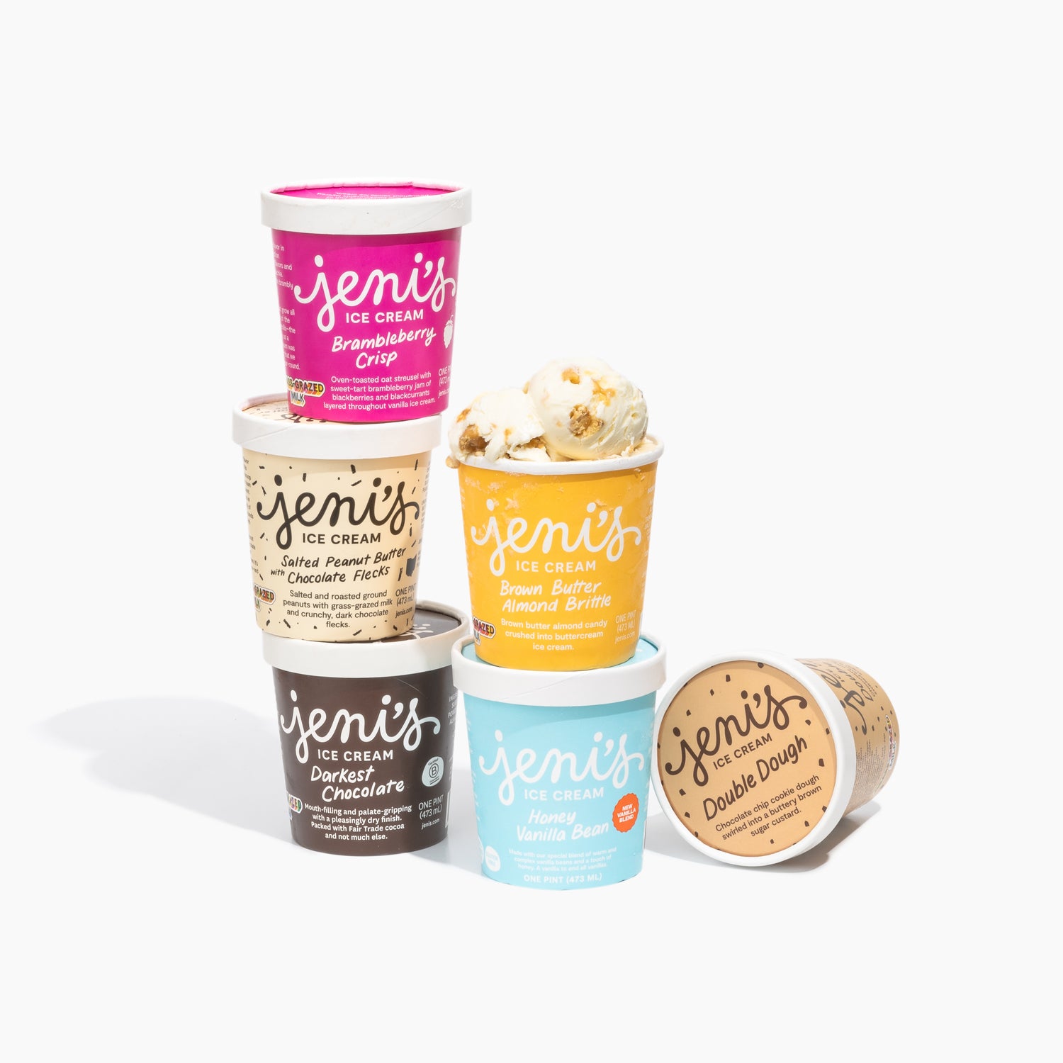 Jeni's Ice Cream containers in various flavors on a white background