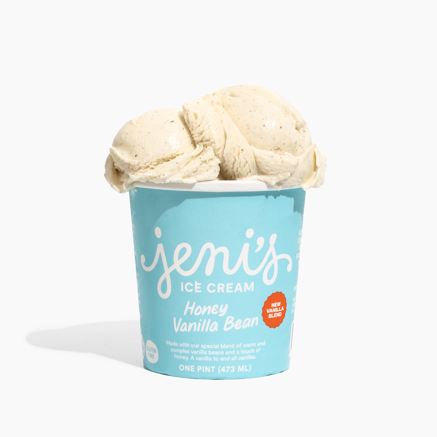 Pint of Jeni's Ice Cream with honey vanilla bean flavor on a white background